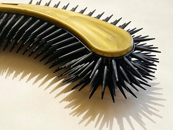 Cat Brush, Black. Designed for Comfort, Created for Cats and Dogs. Ergonomic shape promotes stress free grooming. Great for long to short haired cats. Made in the USA