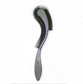 Cat Brush, Black. Designed for Comfort, Created for Cats and Dogs. Ergonomic shape promotes stress free grooming. Great for long to short haired cats. Made in the USA